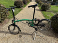 NEW 2026 Brompton C Line 12-Speed Folding Bike Low bar palm green/black