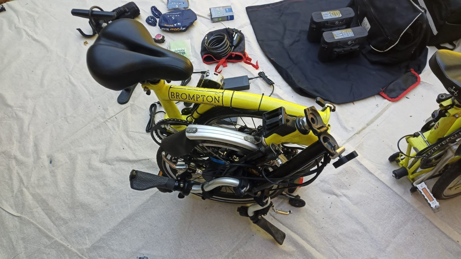 A Pair of Yellow Bromton Bikes with switch conversion. Excellent Condition