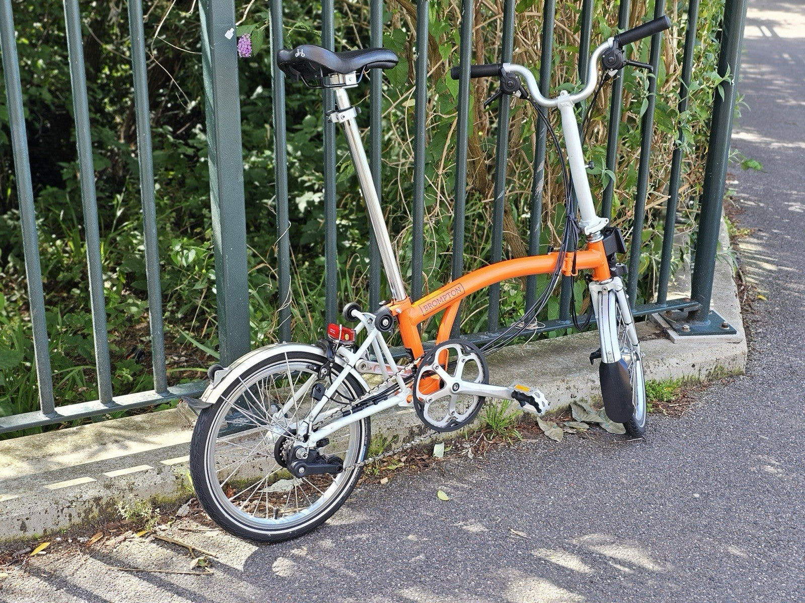 Brompton Folding Bike 16in Wheels Orange/white Silver Mudguards Cruiser Bar