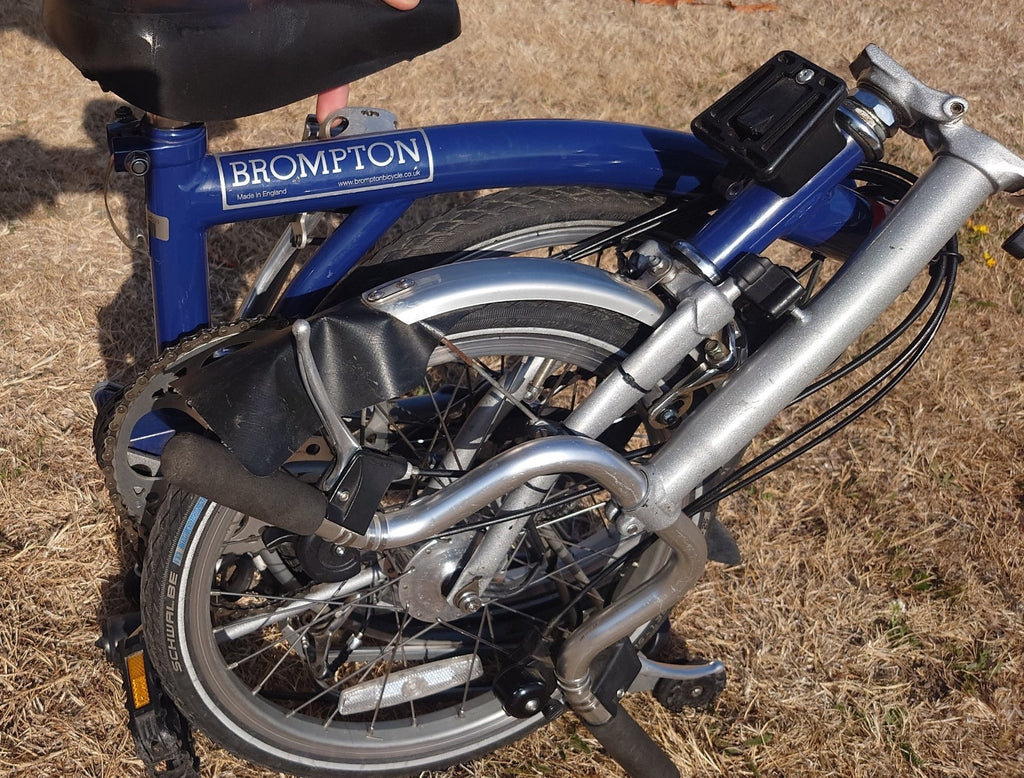 Brompton M6R folding bike good condition front rear rack bag led lights 6 speed