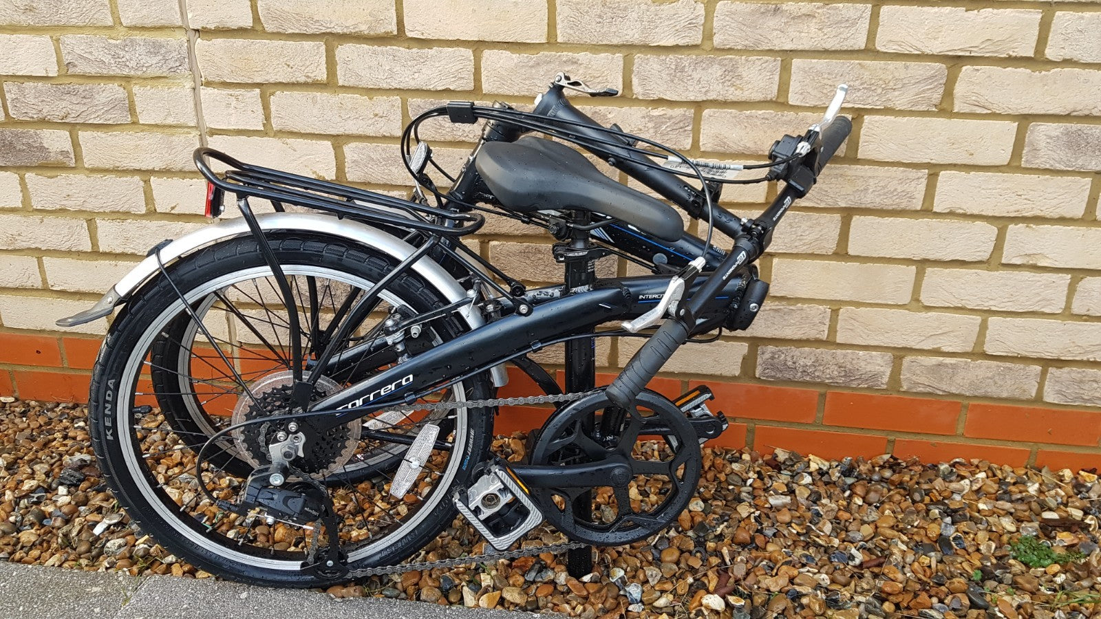 carrera intercity  folding bike, black, 8 speed, exellent  condition