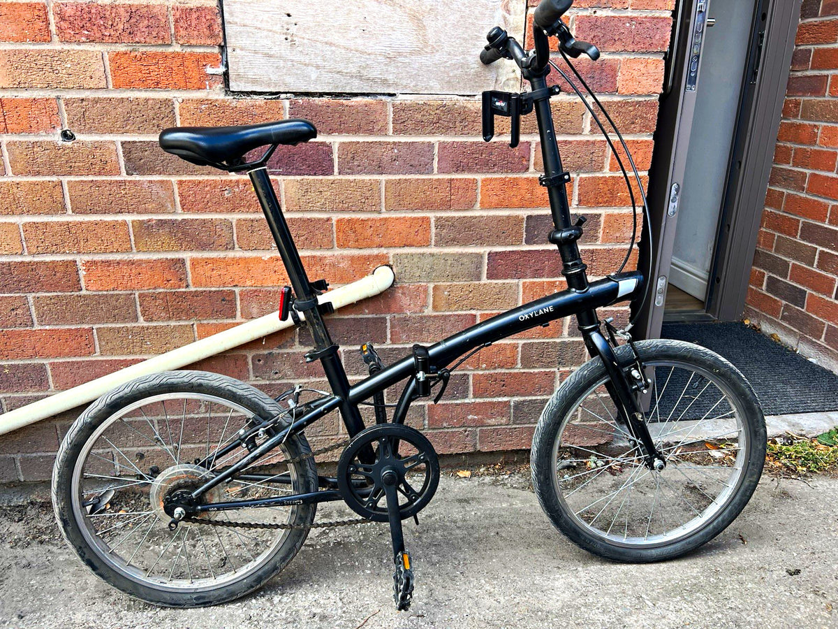 Oxylane 20in Folding Bike, single speed. And Ruck 7 speed