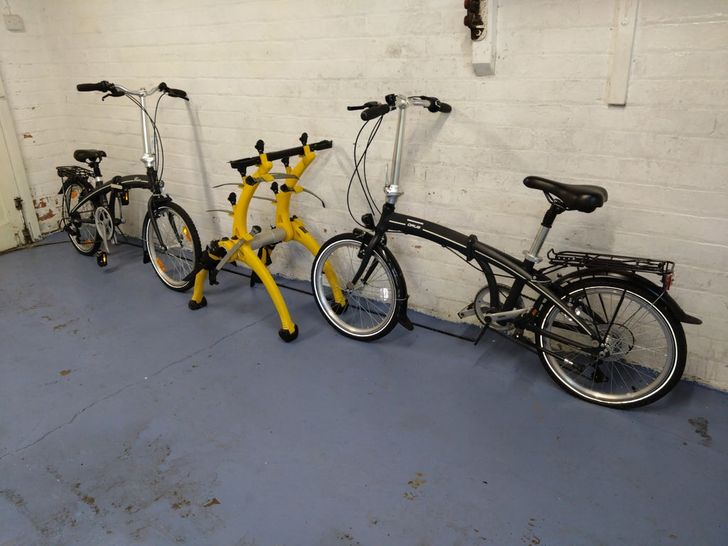 2x Moore Large Orus Folding 7 Speed Bikes + Saris Rack Bones 3-Bike Mount