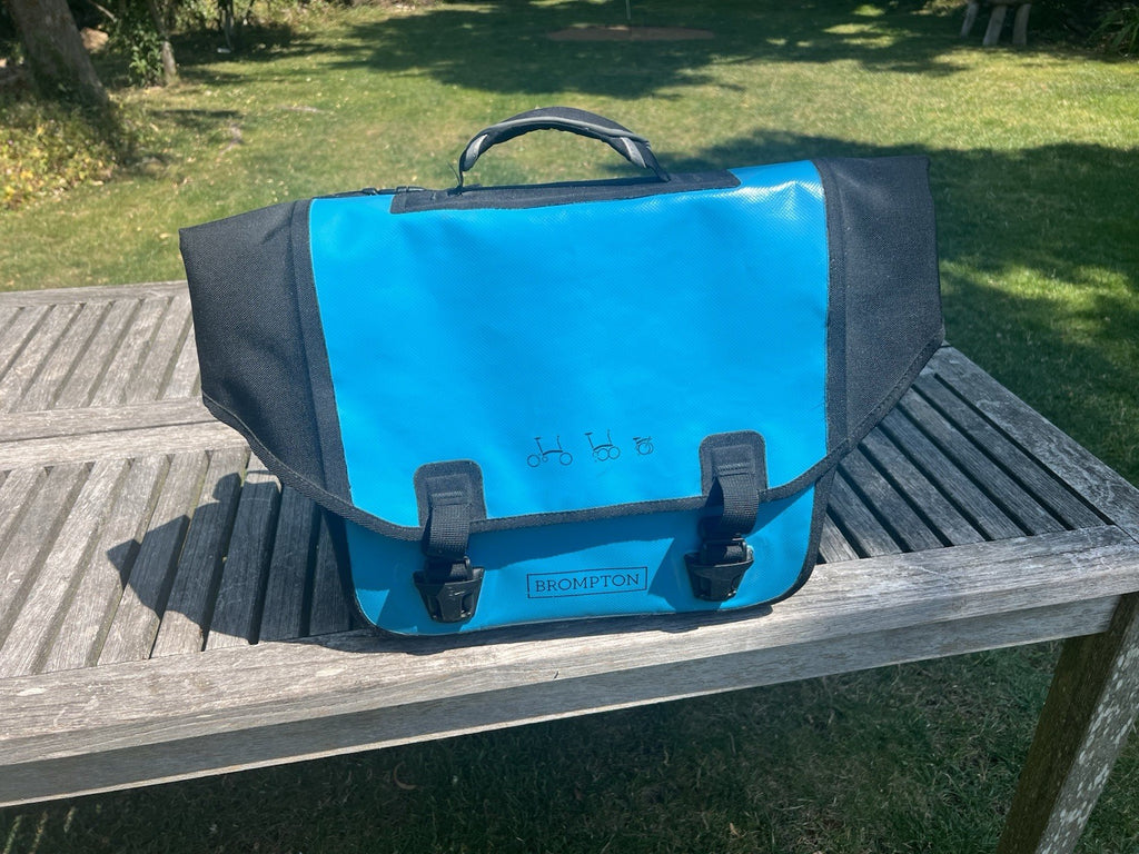 Brompton S2L Folding Bike black plus Brompton/Ortlieb blue front bag