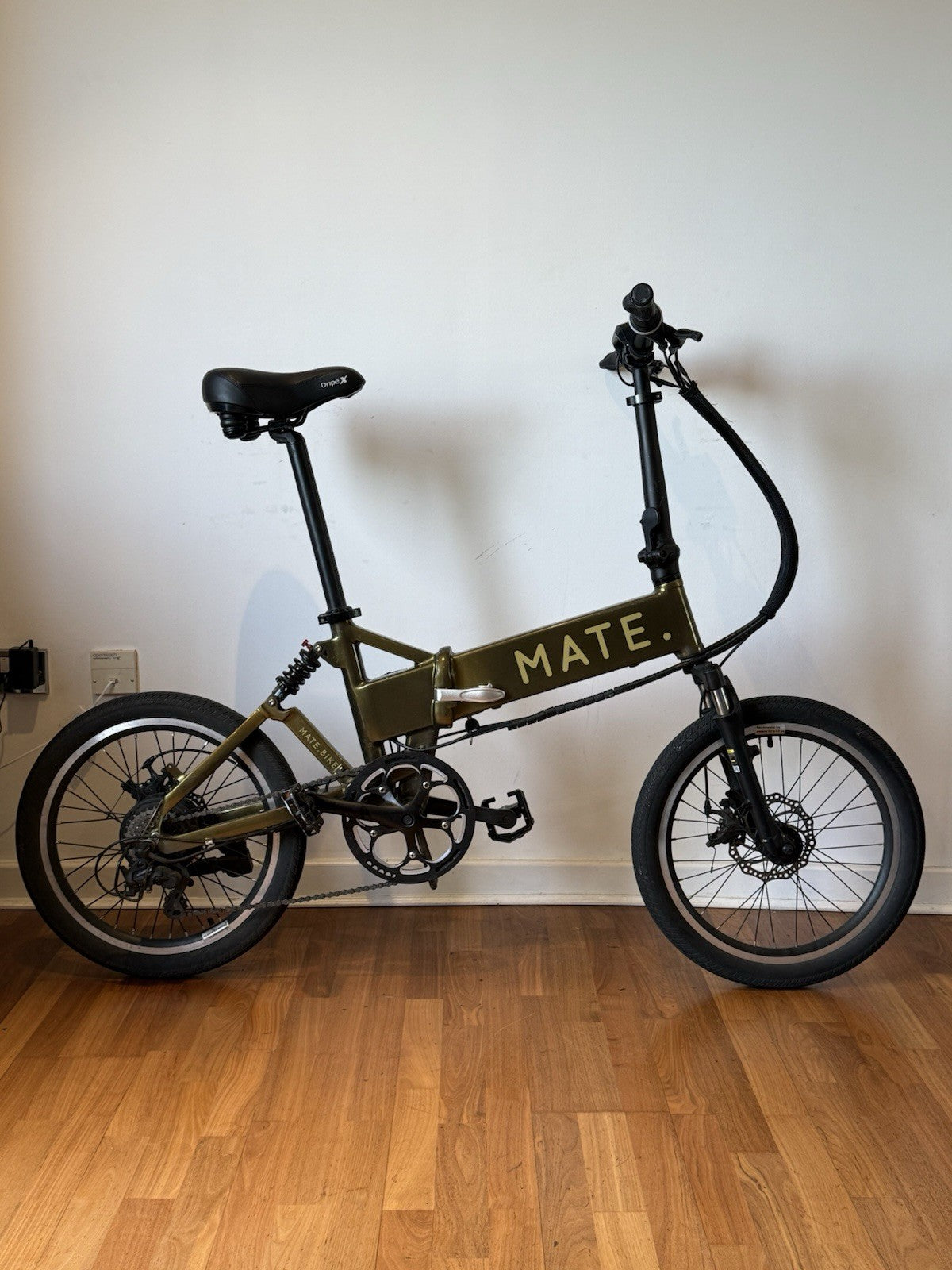 Olive Gold 250W MATE City Bike with 60mile Range, Discs & Full Suspension