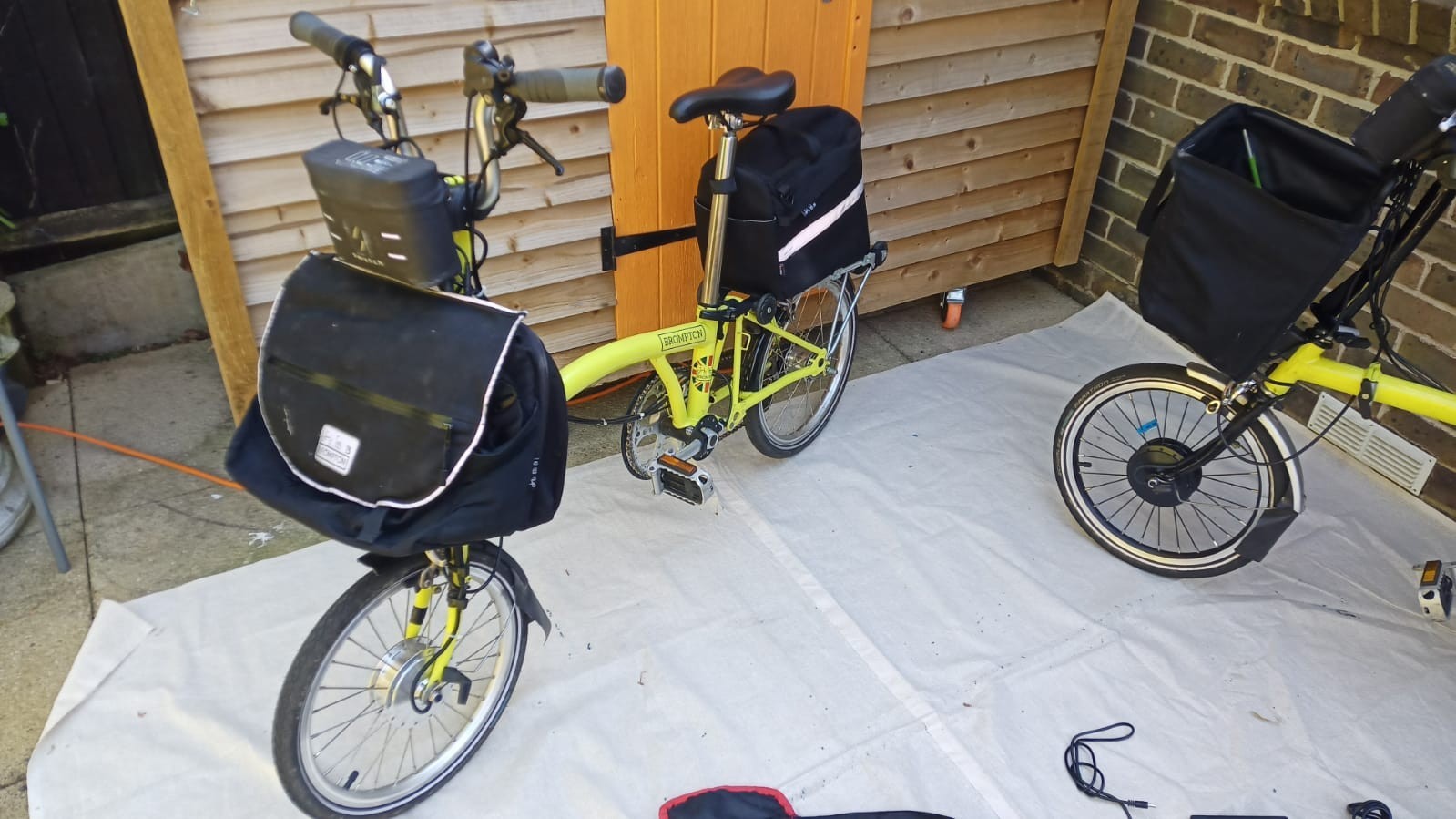 A Pair of Yellow Bromton Bikes with switch conversion. Excellent Condition