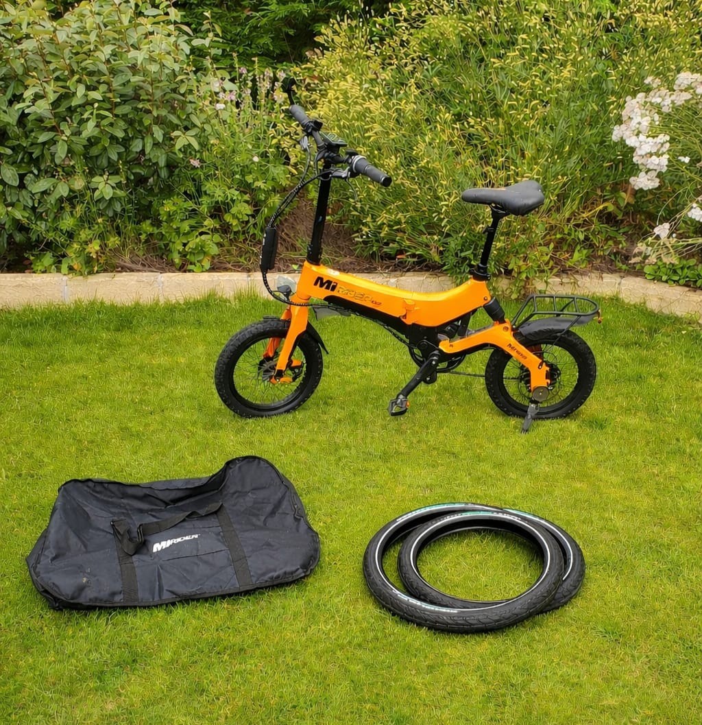 MiRiDER GB 3 16" Orange Good condition Hydraulic brakes, rear carrier, Bag.