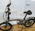 Raleigh Evo 2 is a folding bike featuring 7-speed Shimano gears and a grey frame