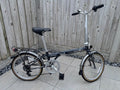 Dahon Speed folding bike, 7 gears, 20" wheels, metallic grey. With storage bag.