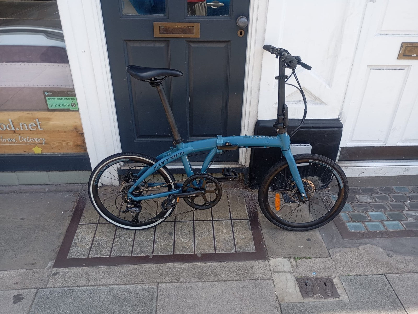 Carrera Intercity Disc 9 Speed Folding Bicycle Matte Blue Adult Fold Up Bike