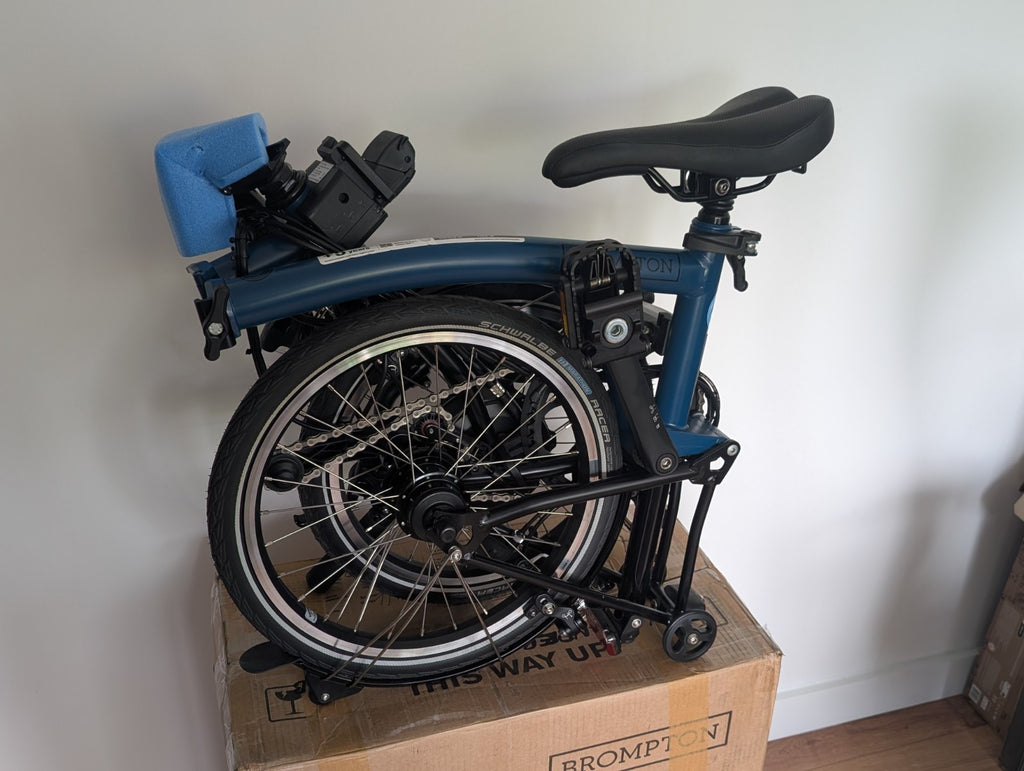 Brompton Electric C Line Explore Mid + Rack - 12 Speed - Ocean Blue Folding Bike