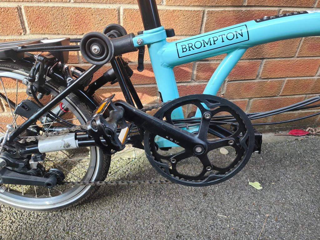 Brompton Electric C-Line, High. 6-speed. Turkish Green. Large and Small bags