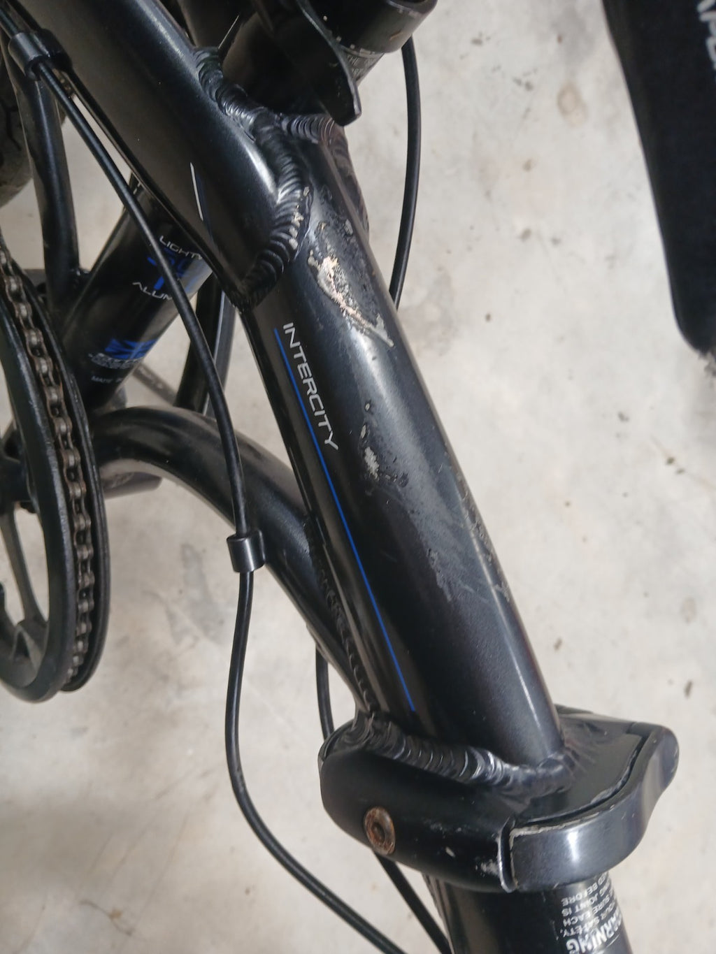 Carrera Intercity 20in Folding Bike Aluminium 8-Speed Grip Shifter Black/Blue