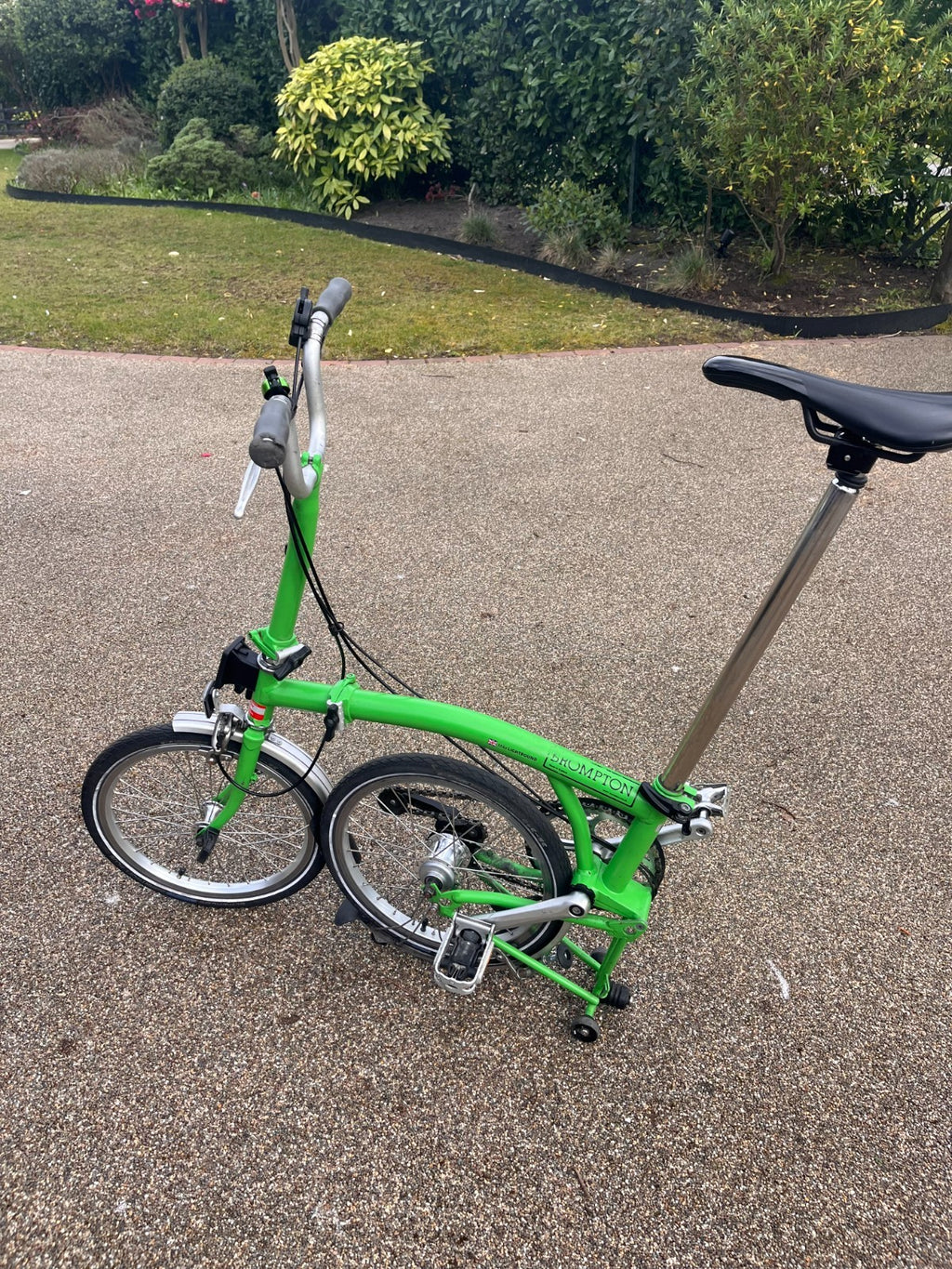 Lime green Brompton folding bike 3 speed