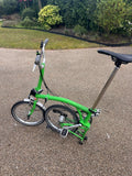 Lime green Brompton folding bike 3 speed