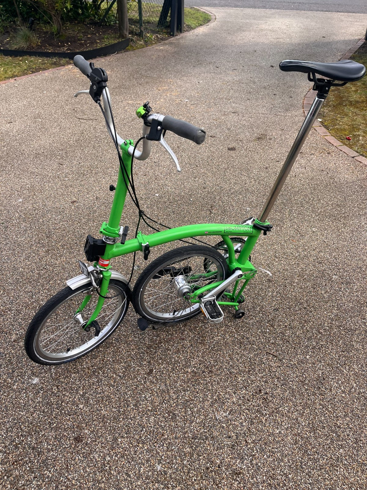 Lime green Brompton folding bike 3 speed