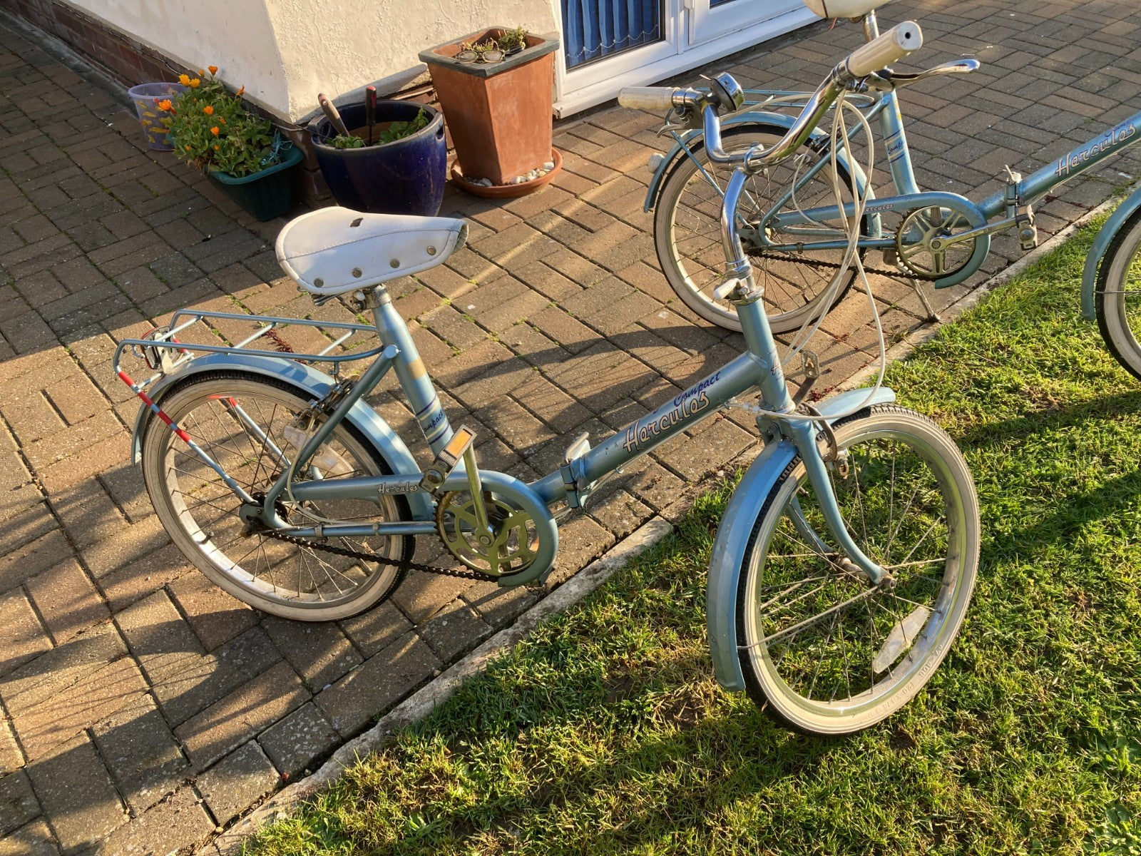 The Vintage Retro 1970s Hercules Compact folding bikes in blue