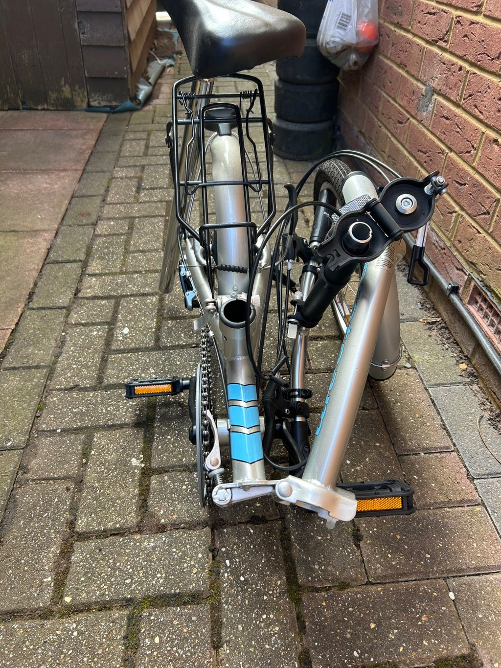 silver unisex fold up bike, aluminium alloy, never used
