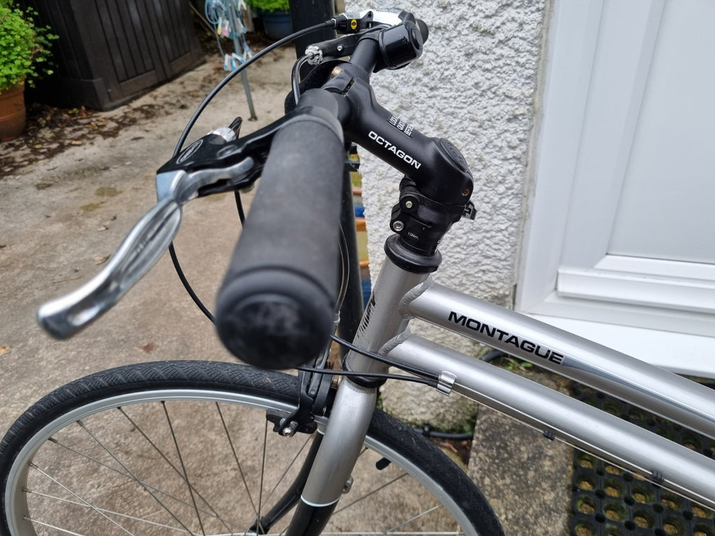 Montague Urban folding bicycle with full size wheels. Silver excellent condition