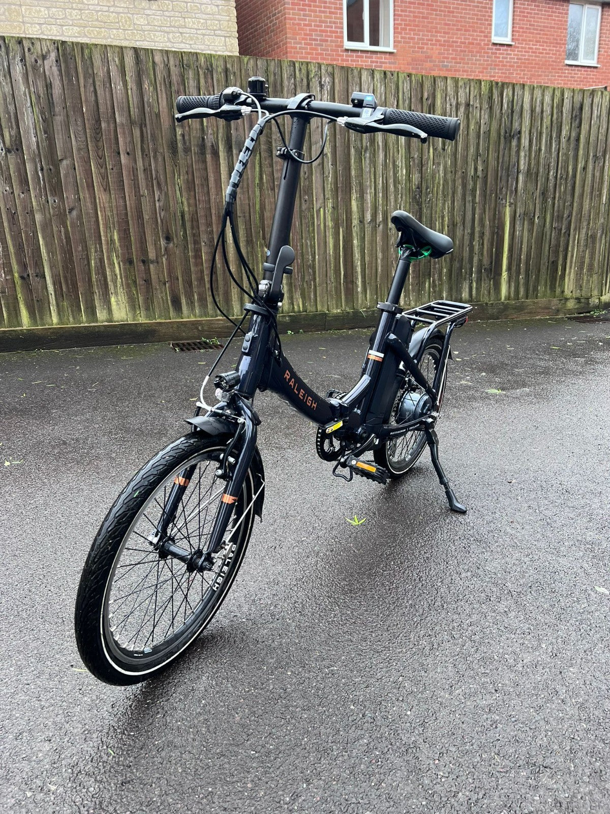 Raleigh Stow-E-Way Folding Bike In Dark Blue Designed to be packed away