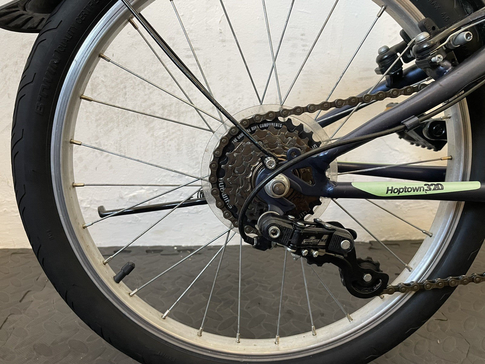 B Twin Tilt 120 Folding Bike 20 Inch Wheels. 6 Speed Matt Navy And Neon.