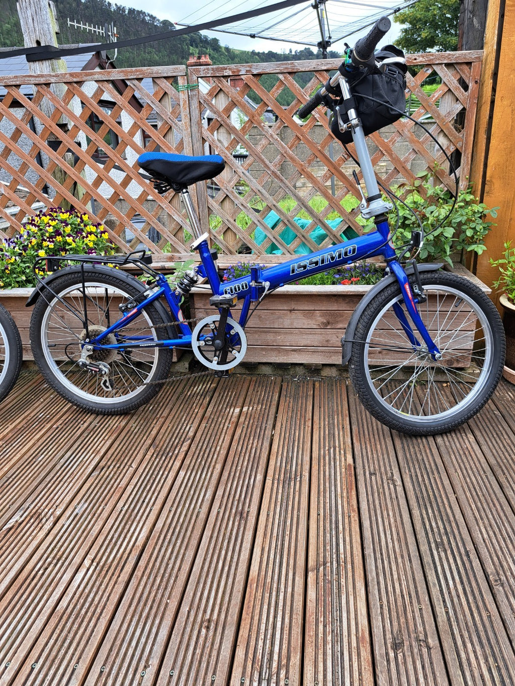 folding bike, blue 5 speed with parcel rack, 29" wheels, good condition.