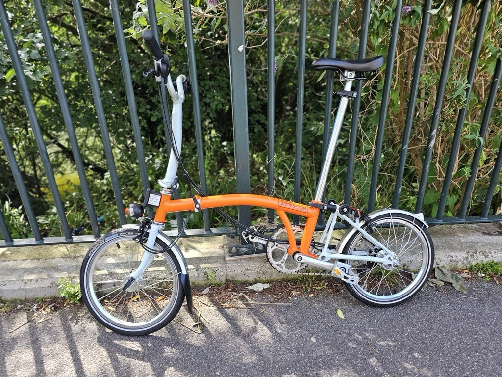 Brompton Folding Bike 16in Wheels Orange/white Silver Mudguards Cruiser Bar