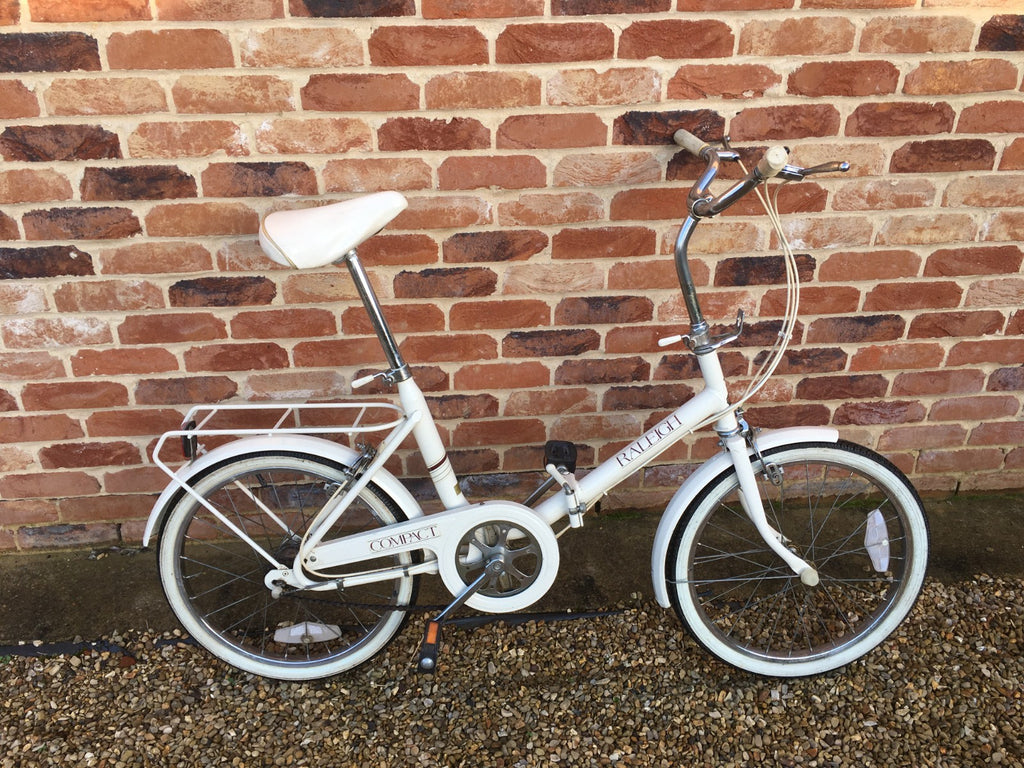 Raleigh Compact white foldable unisex bicycle used,