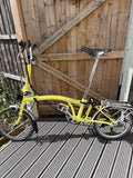Brompton M6R Folding Bike - 6 Speeds - Yuzu Lime Rear Rack Carrier Block