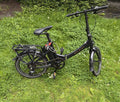 Raleigh Black 20in Folding Bike V-Brakes Twist Grip, Rear Rack & Mudguards