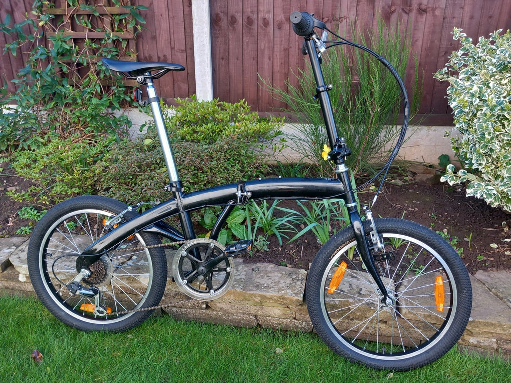 Folding Bike. 20-inch wheels. Very Good Condition. Plus Extras