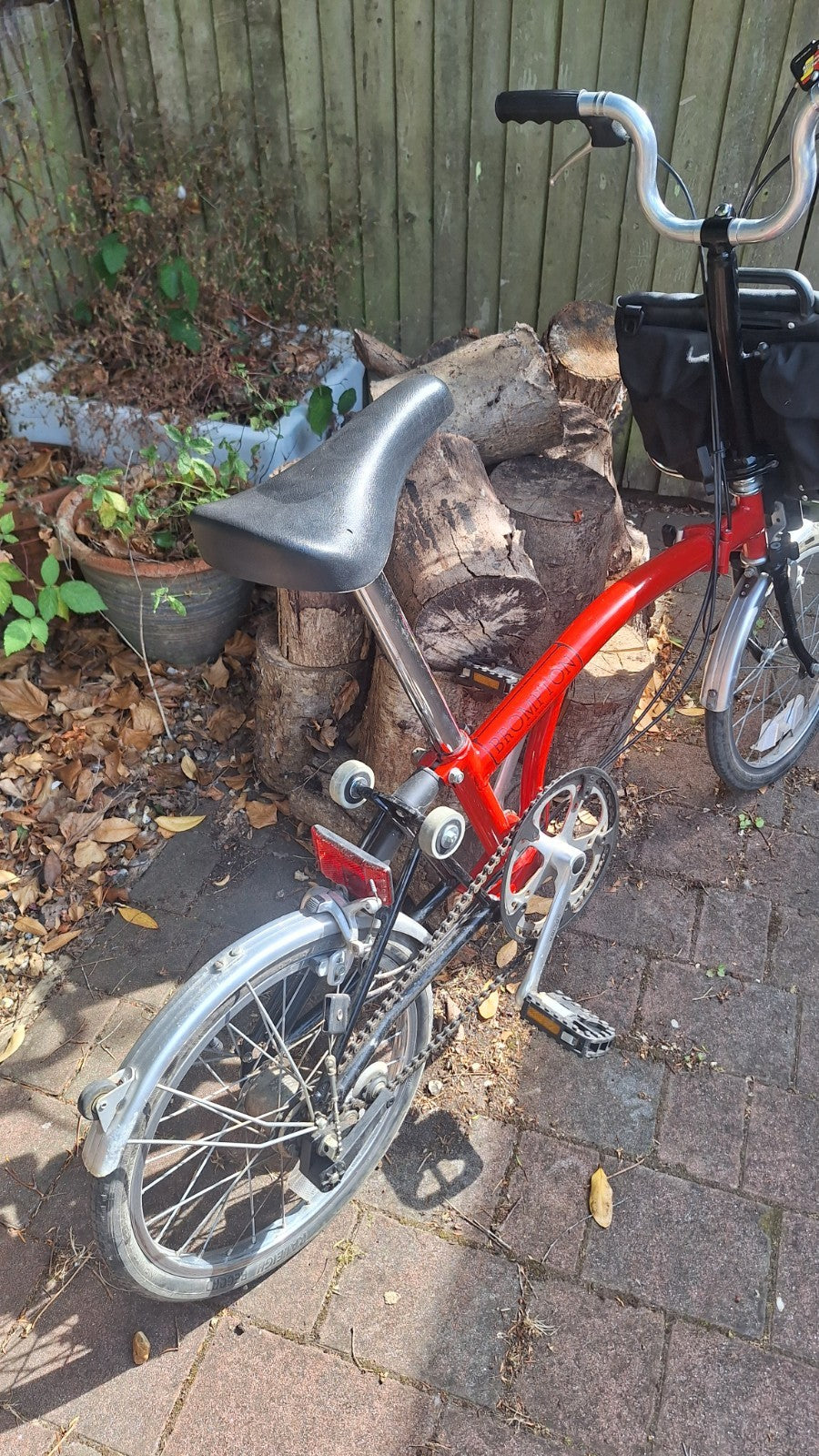 Brompton S3L Folding Bike 3-Speed . With front pannier bag and bike storage bag.