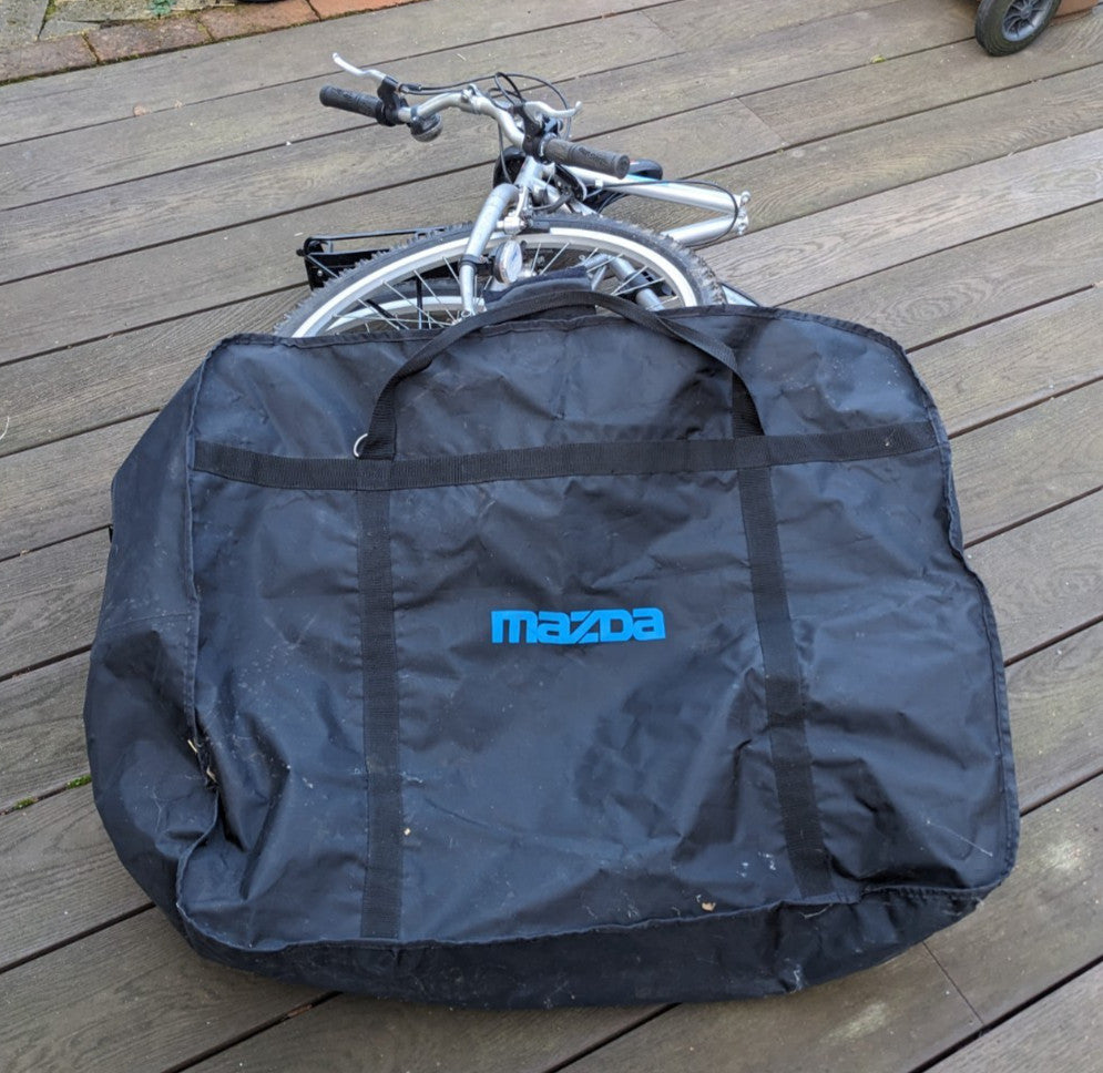 Mazda 26” Compact foldable Town and Country bike.  Minimal use.  Great condition