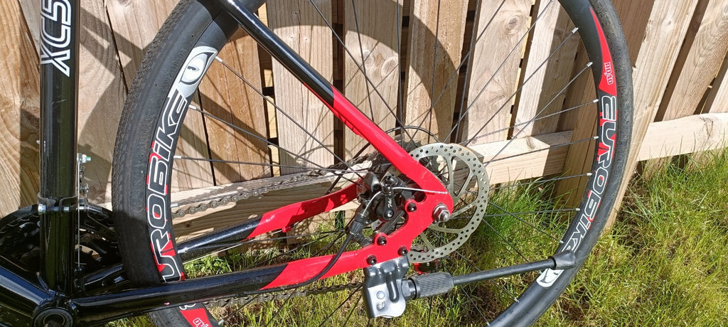 EuroBike XC580 Gravel Bike, with indoor resistance trainer kit
