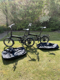 2 X Carrera Crossfire Folding Bikes With Storage Bags.