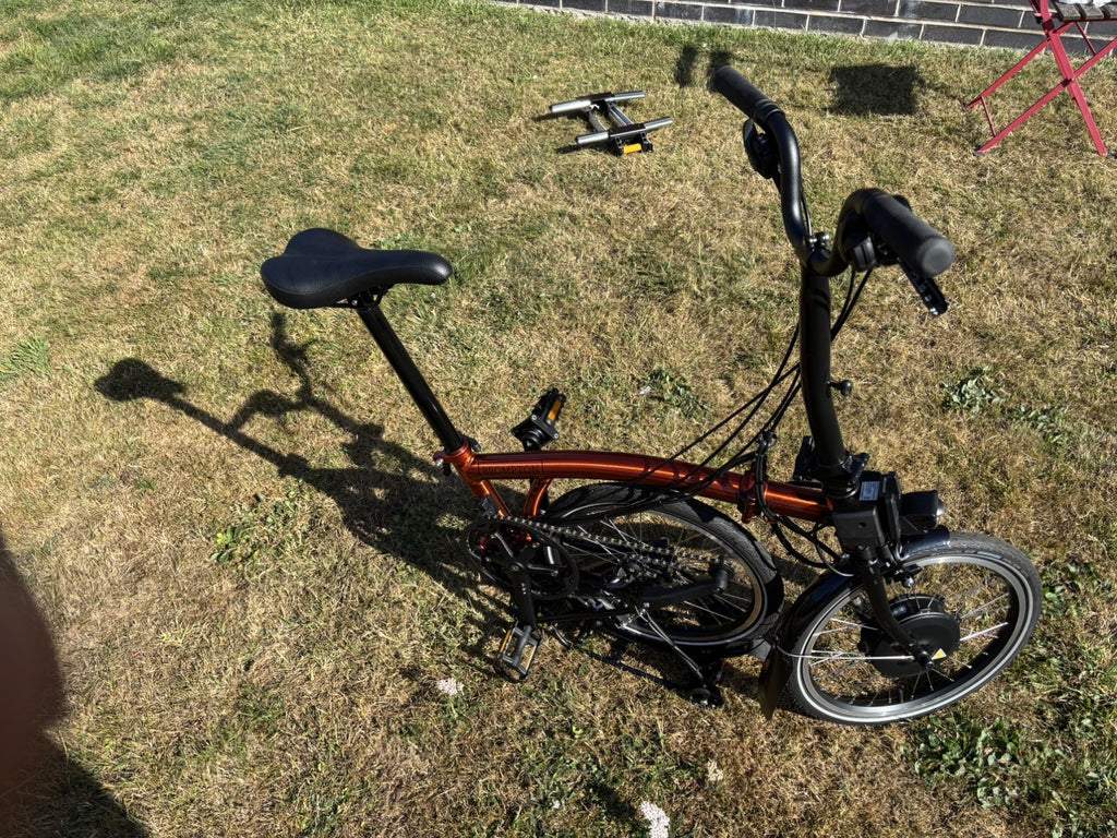Brompton Electric C Line Explore Mid + Rack - 12 Spd - flame lacquer