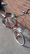 Vintage classic ladies Red Folding bicycle. With gears. Abit of rust in places.