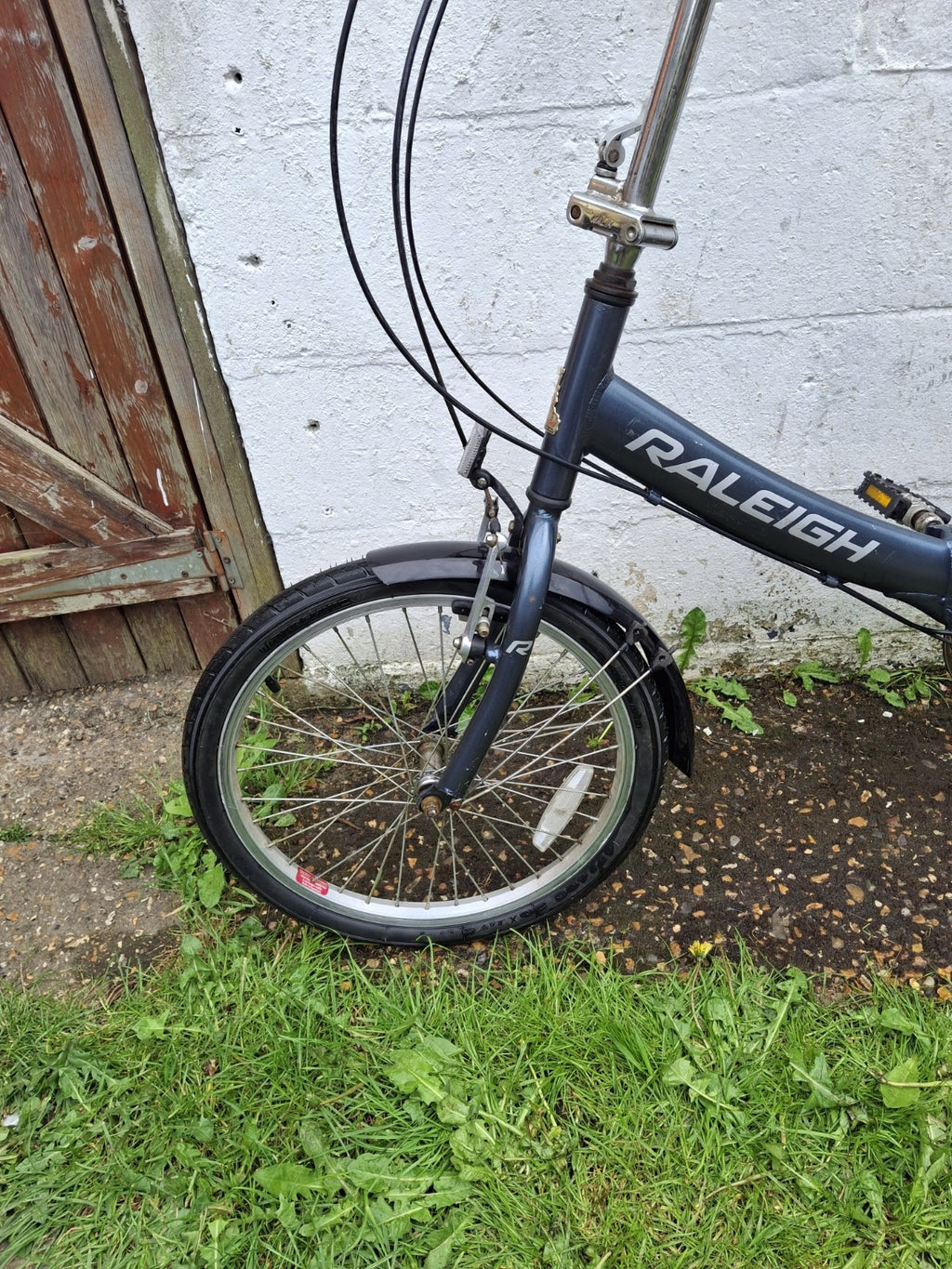 Raleigh EVO 7SP Folding Bike, Aluminum Frame, 20" Wheels, 7 Speed with Revo Grip