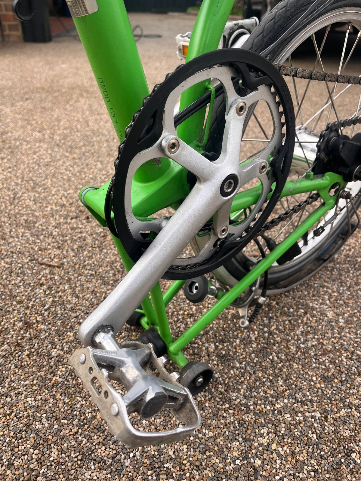 Lime green Brompton folding bike 3 speed