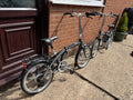 A Pair of Orus Folding Bikes with 20 Wheels one never used one used once