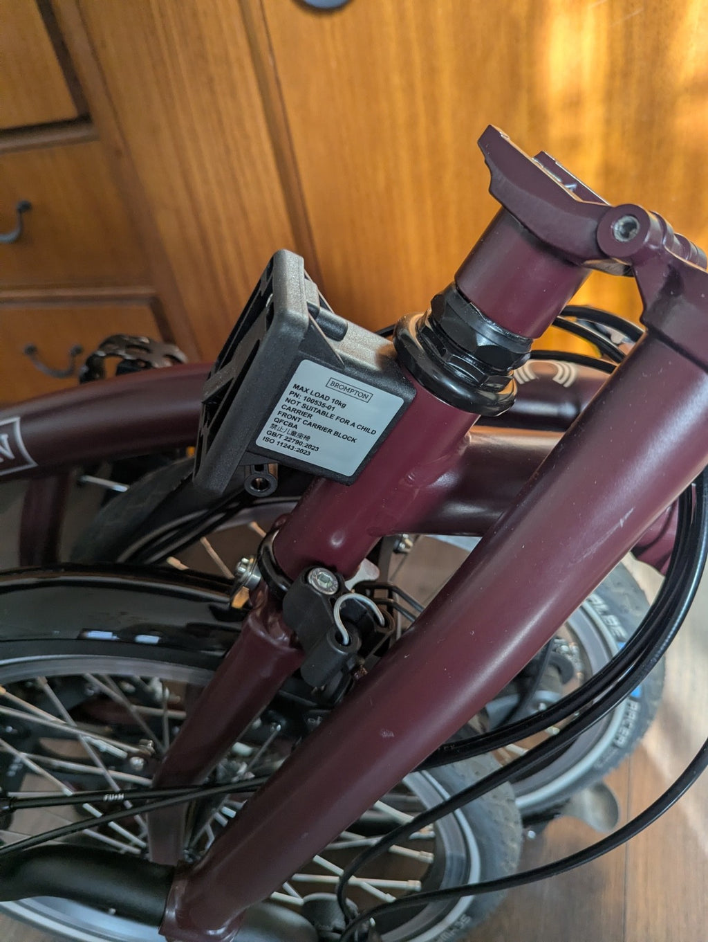 Brompton bike C-line 12-speed 2026 mid bar in Burgundy colour