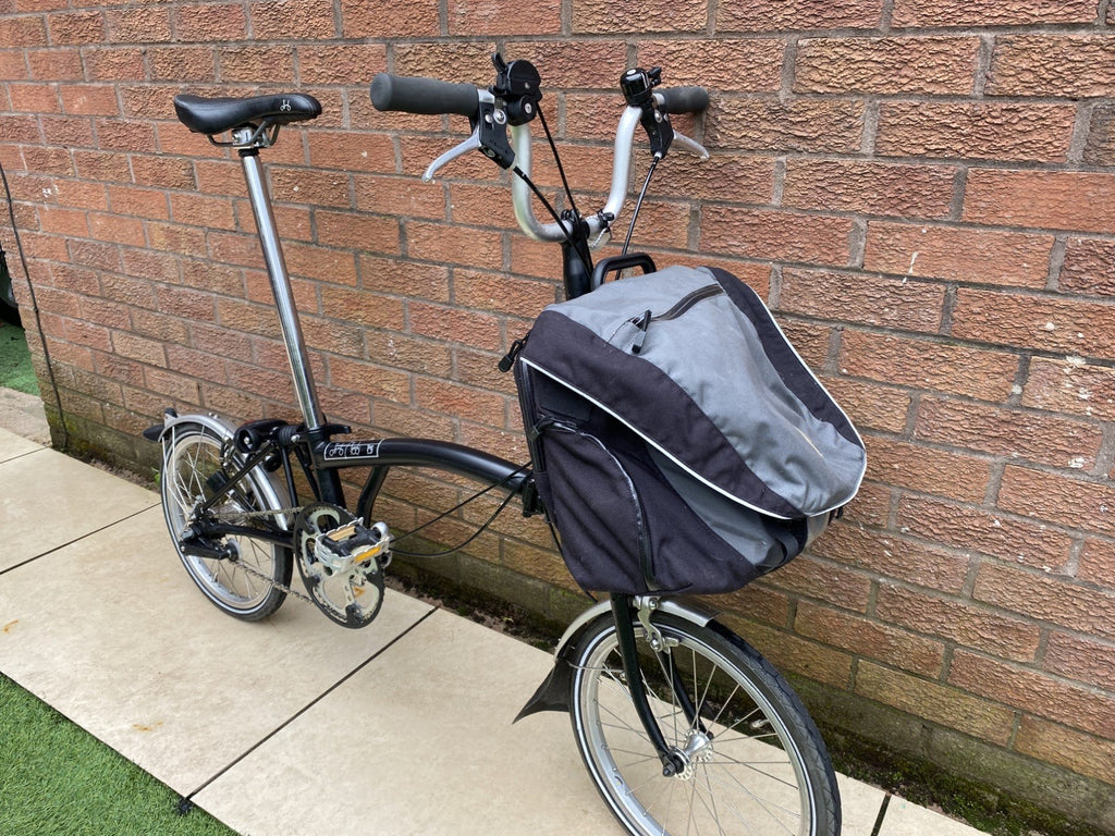 Brompton Folding Bike 3-Speed comes with front bag.