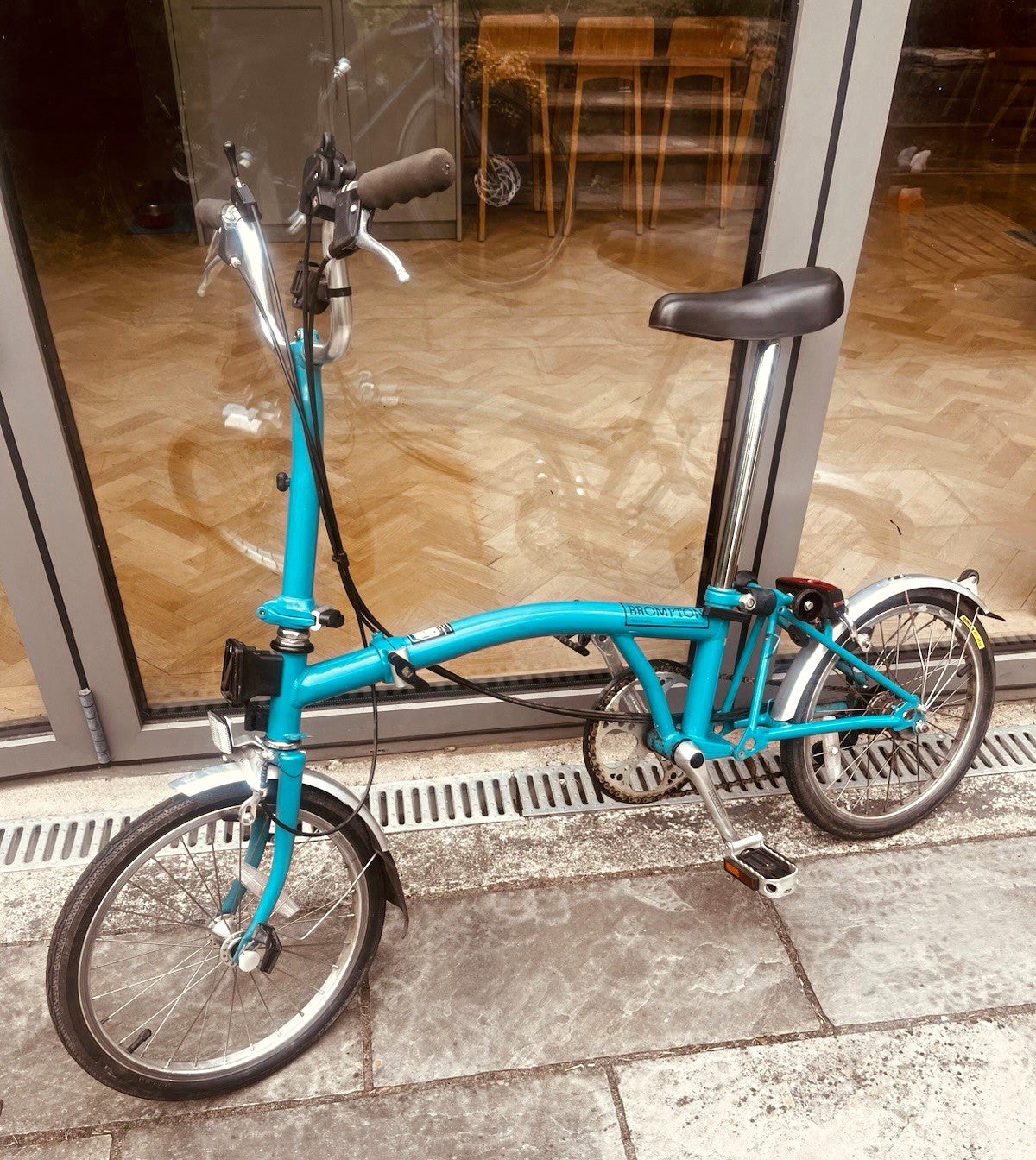 Brompton Folding Bike. Classic M3L model. 3 speed, lock and pump.