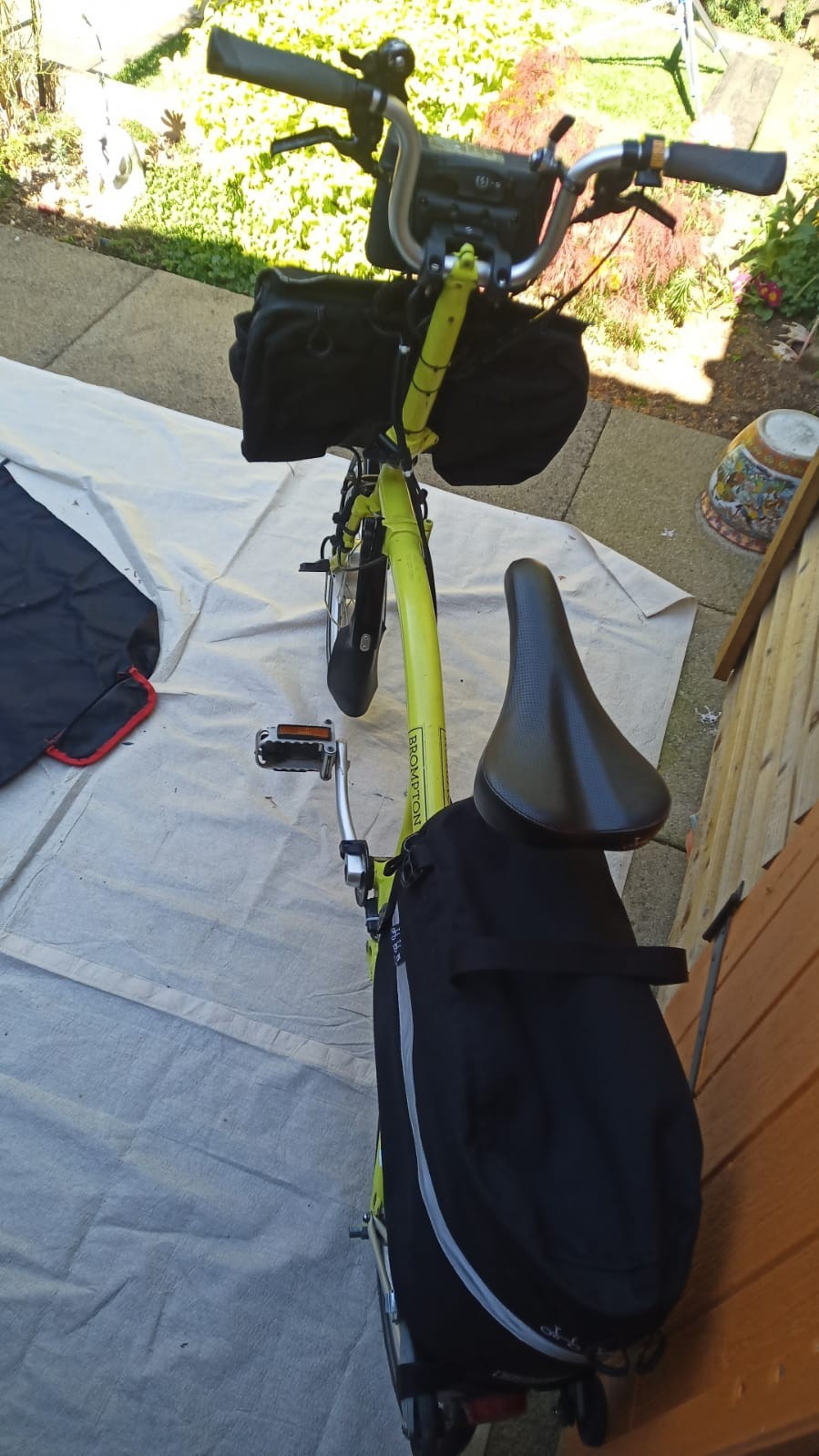 A Pair Of Canary Yellow Bromton Bikes