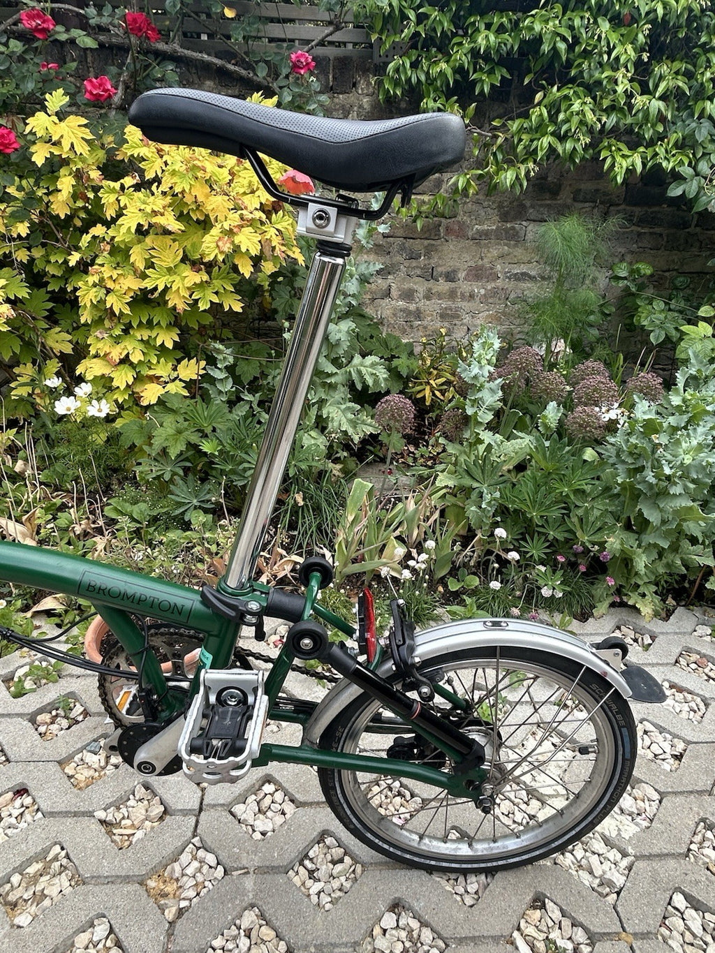 Green Folding Brompton Bike With Swytch Kit In Good Condition