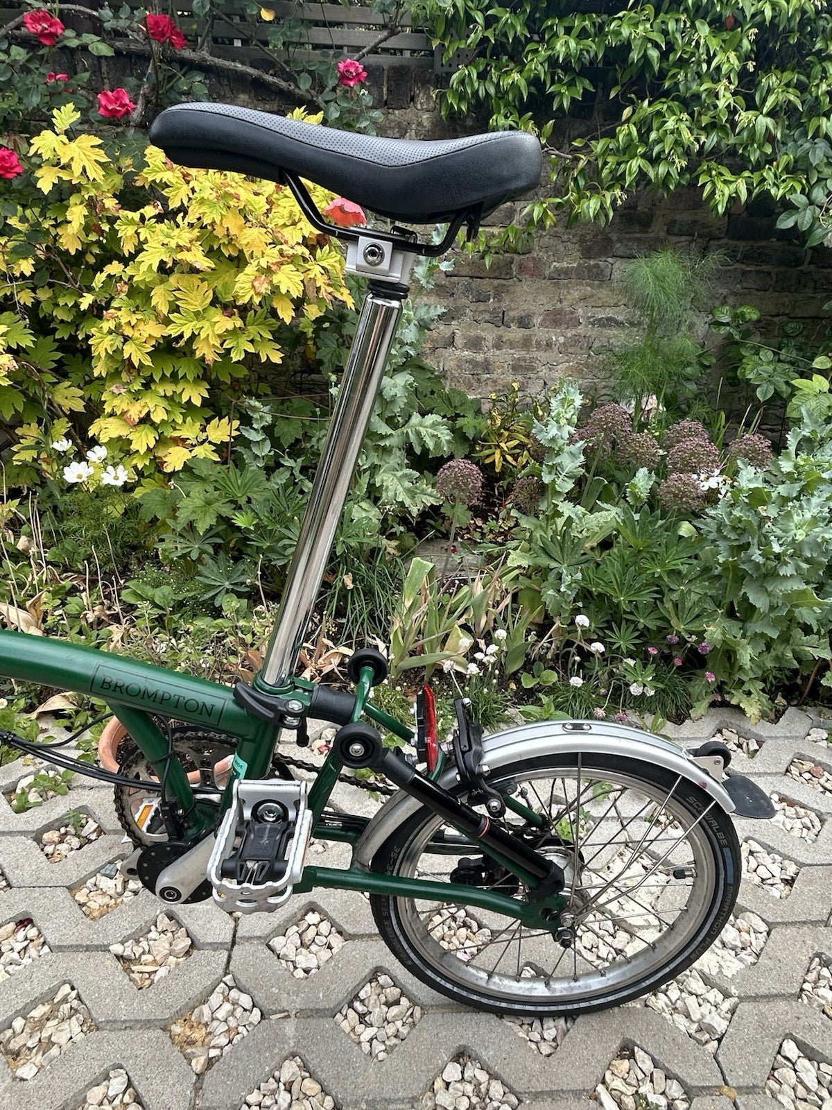 Green Folding Brompton Bike With Swytch Kit In Good Condition