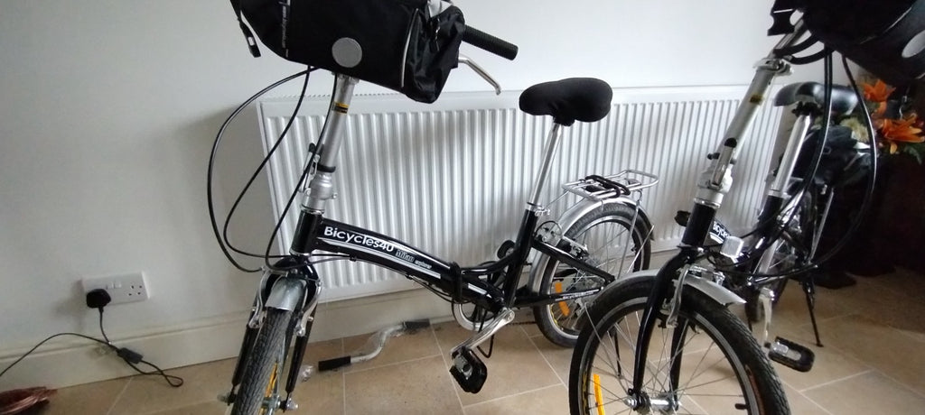 Pair of Bicycles4u Milan Explorer Folding Bicycle 20 Wheels with bags etc