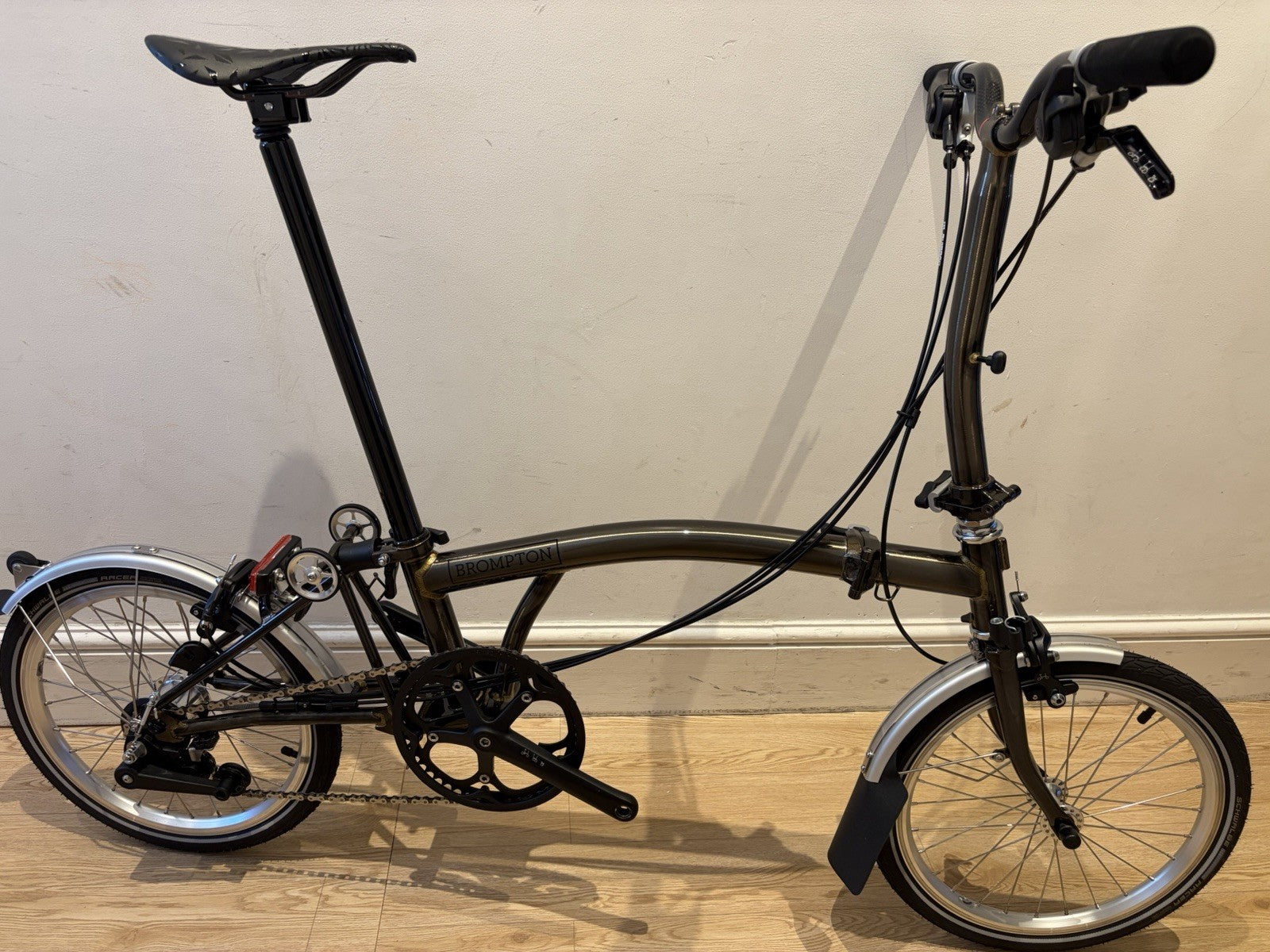 Brompton Folding Bike 16 in black lacquer with Mudguards & Reflectors