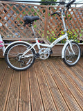 folding bicycle; 5 speed shimano gears, white, 20" wheels, good conditio