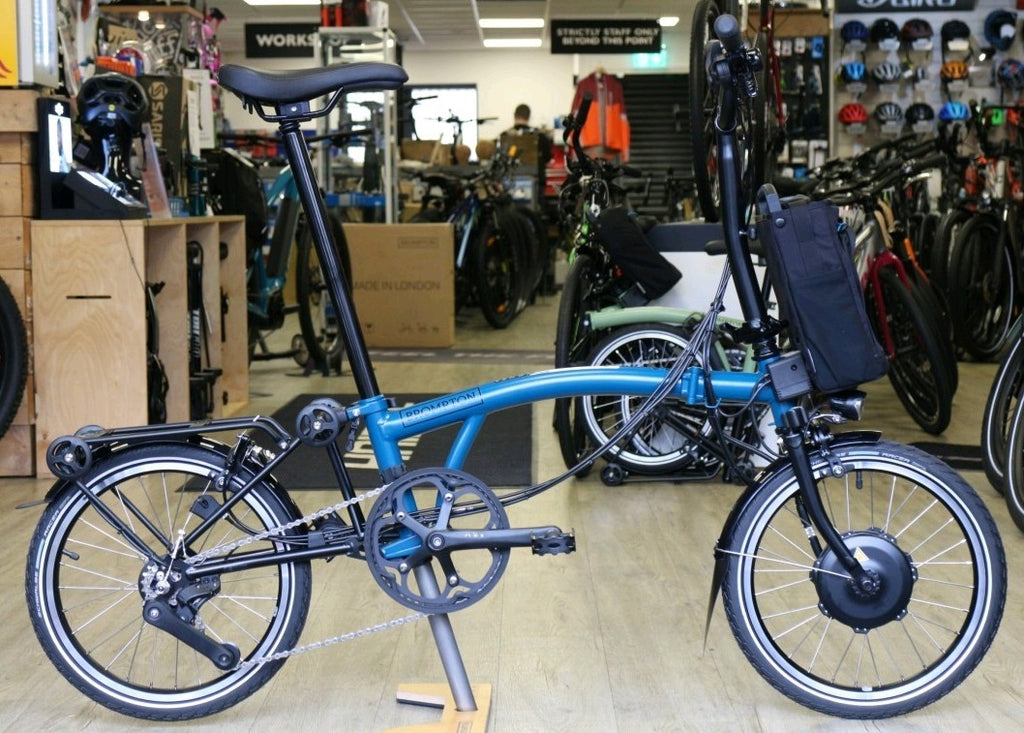 Brompton Electric C Line Explore Mid + Rack - 12 Speed - Ocean Blue Folding Bike